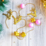 Бусы на ёлку 1,0 м «Подарки, олени и шарики», золотисто-розовый